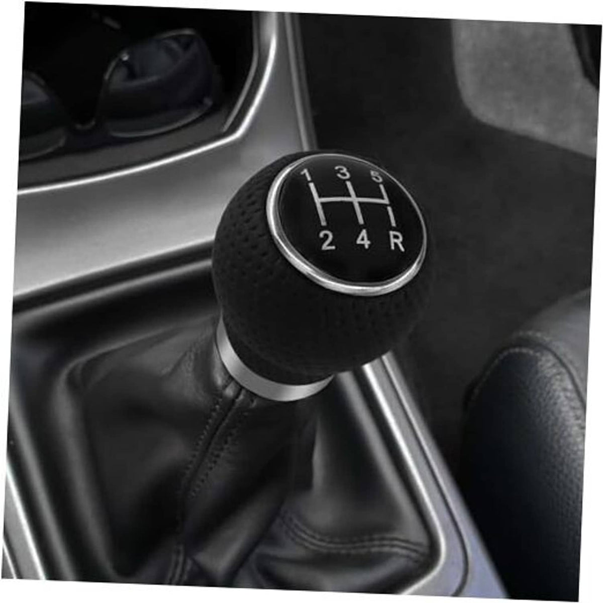 Black 5-speed gear shift knob with silver ring, perforated grip, shift positions 1-5/R