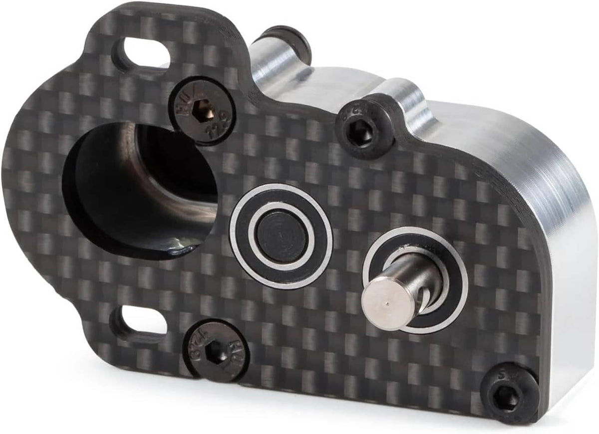 RC gearbox side view with carbon-fiber housing, metal bearings, and mounting screws