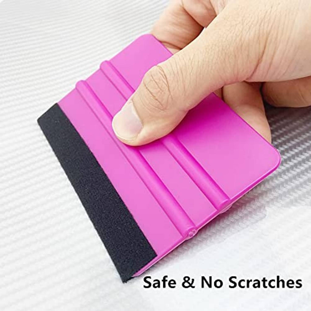 Purple vinyl squeegee tool pressed onto film, showing safe, no-scratch felt pad