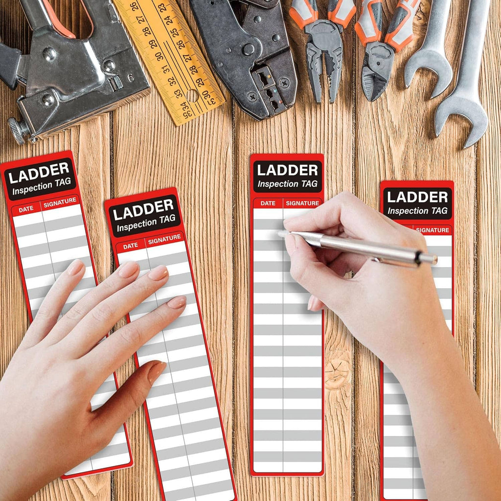 Hands applying ladder inspection stickers on wood; red header with date and signature