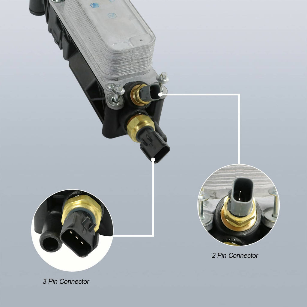Oil filter adapter housing with brass fittings and 3-pin and 2-pin electrical connectors