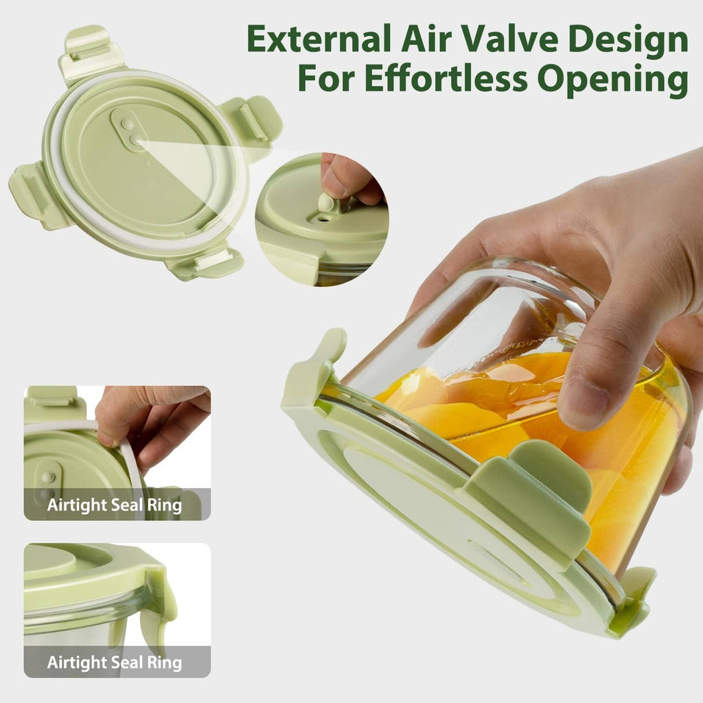 Green glass meal prep container with airtight snap lid and external air valve.
