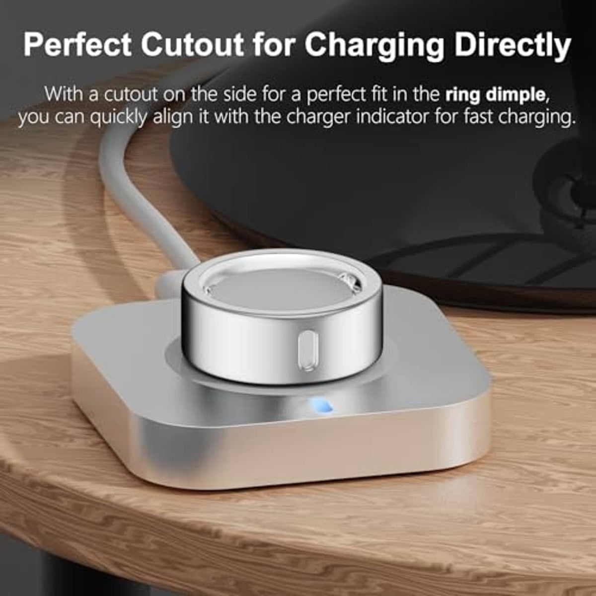 Silver charging ring cover with side cutout on a charging dock base