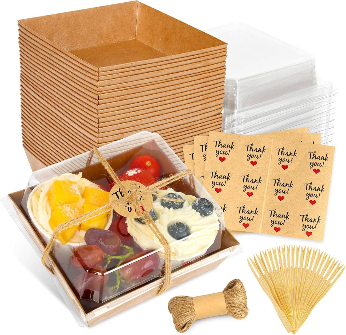 Stacked kraft charcuterie boxes with clear lids, dessert assortment and thank-you stickers