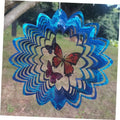 Hanging metal butterfly wind spinner with blue layered petals and butterfly center