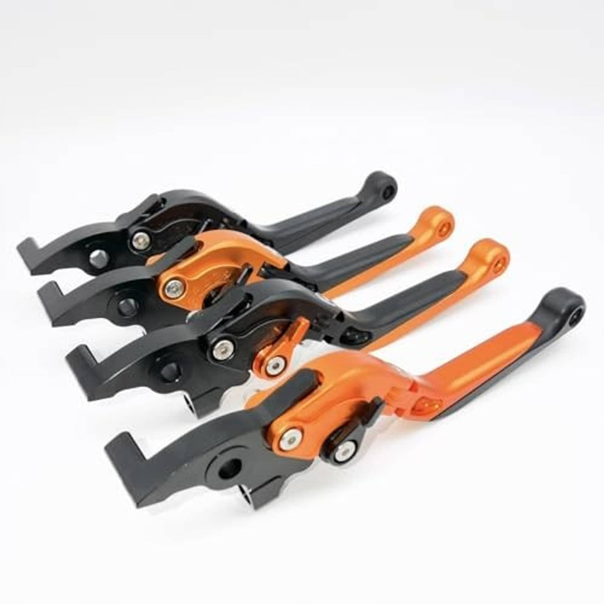 Orange and black motorcycle brake and clutch levers with black mounting brackets