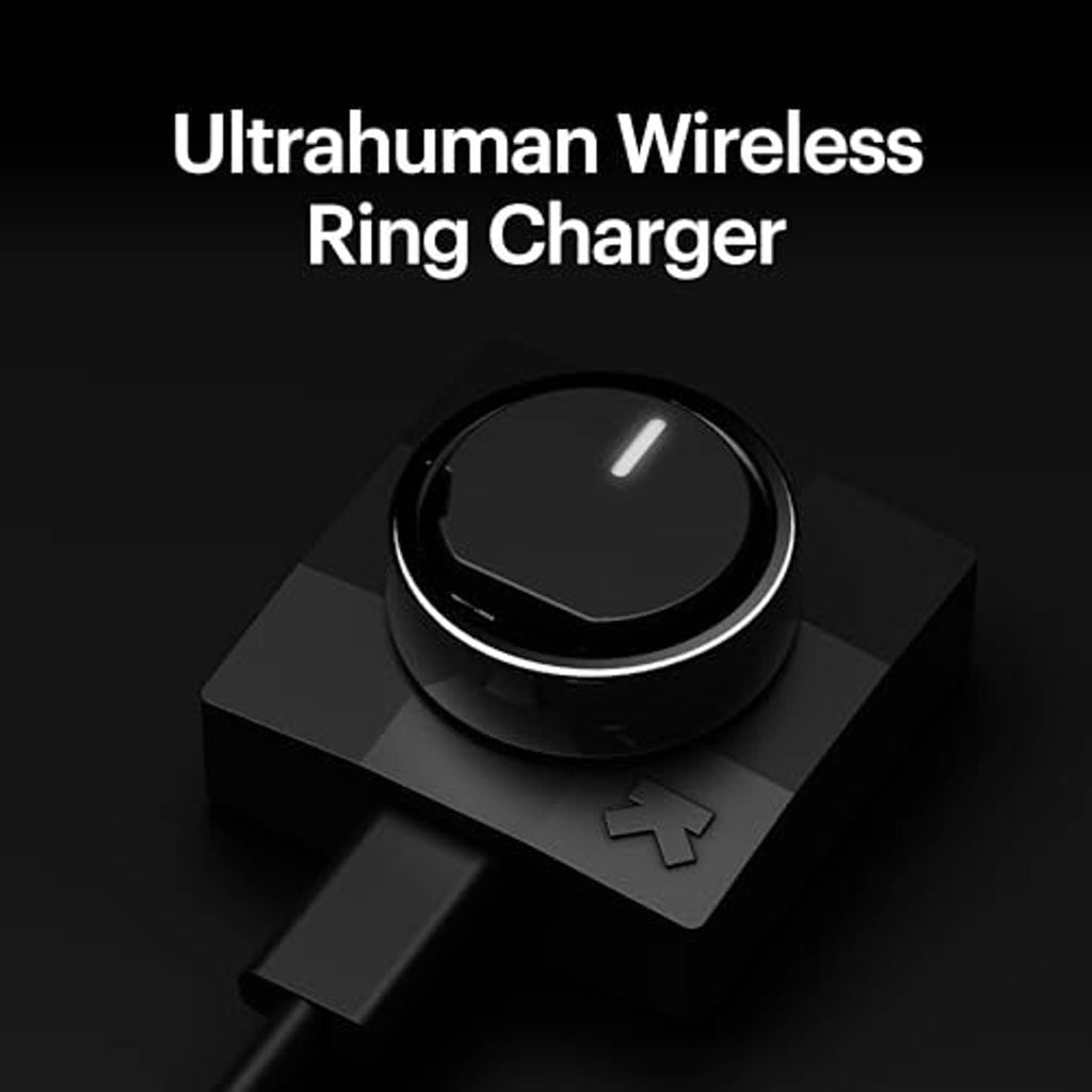 Black ring charger on square dock base with white accent light around top