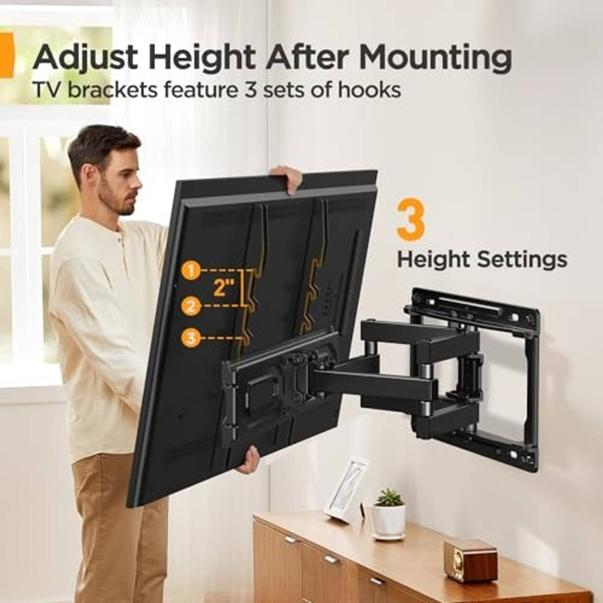 Full-motion TV wall mount with three height adjustment settings after installation