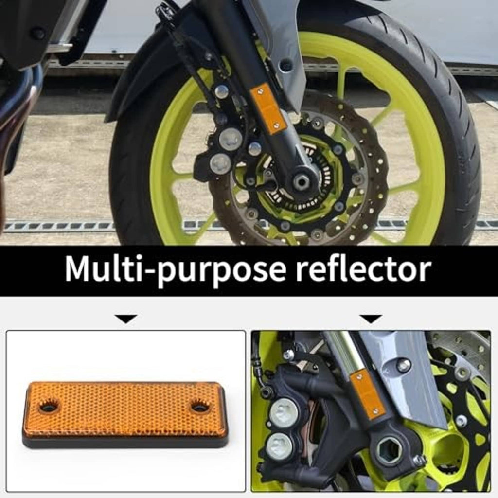 Orange rectangular reflector plate for mounting, shown with close-up of screw holes