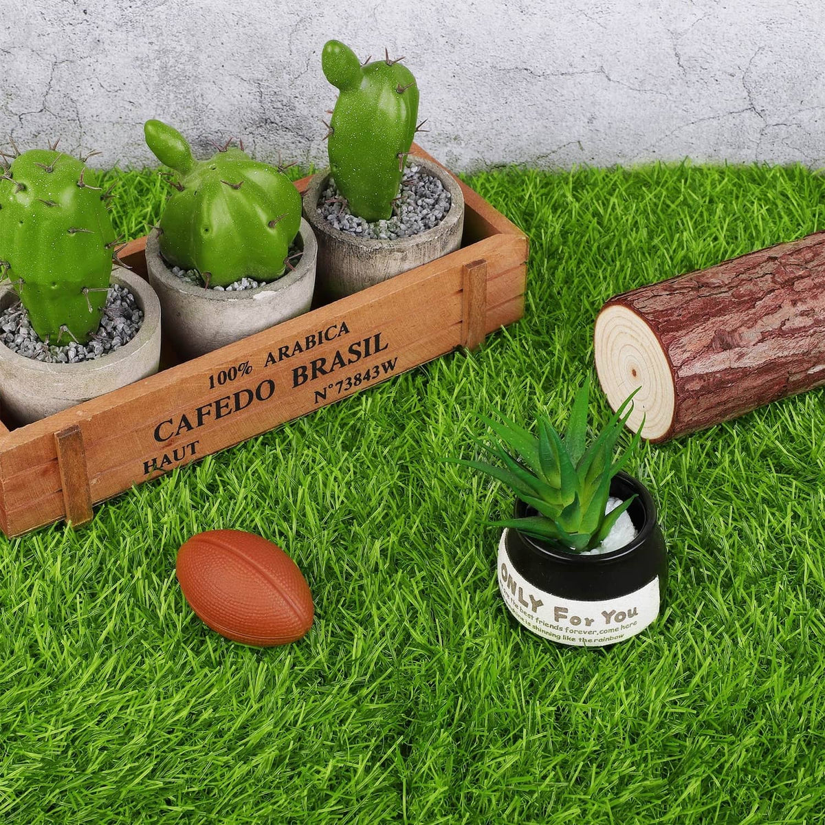 Green artificial grass mat laid outdoors on a patio surface