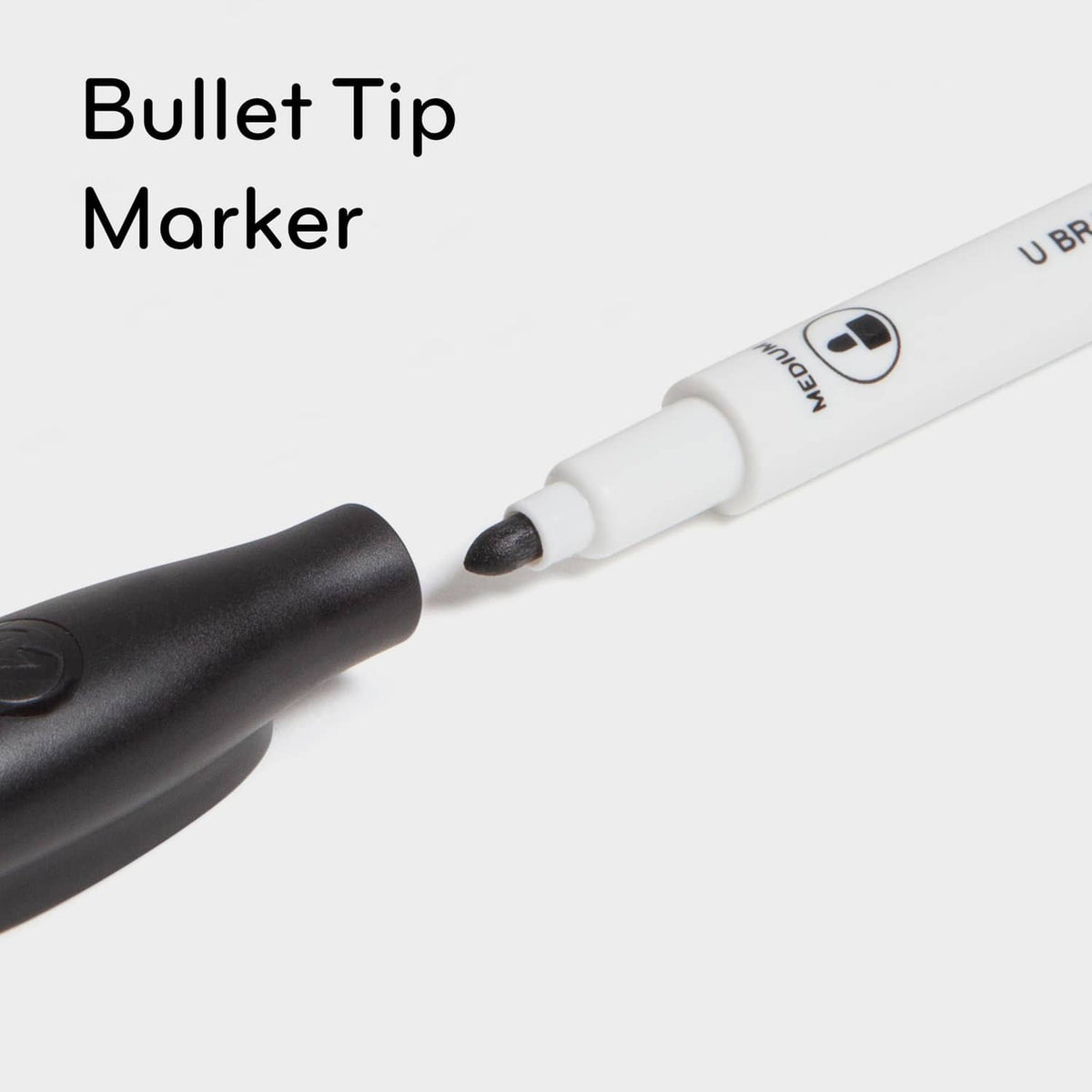 Black bullet tip dry-erase marker with white body for locker board marking