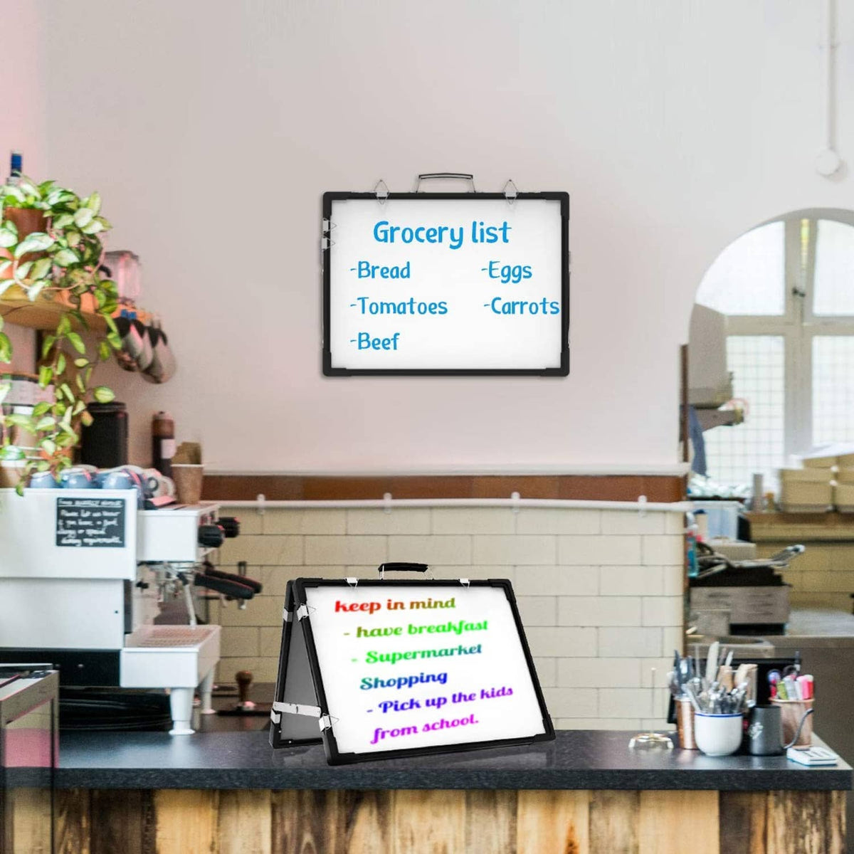 Portable dry erase whiteboard with black frame, mounted for wall viewing