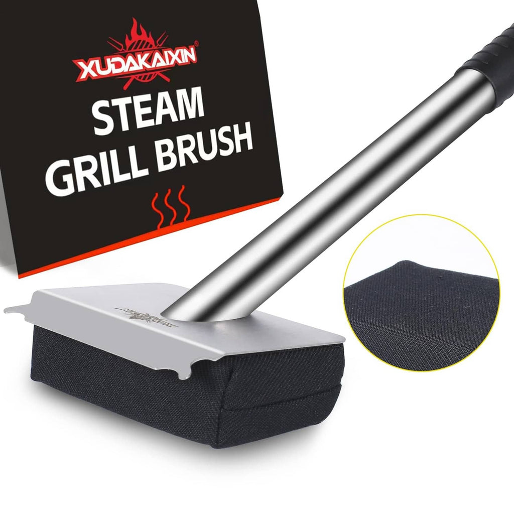 Bristle-free steam grill brush with black rectangular scrubbing pad and metal handle