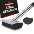 Bristle-free steam grill brush with black rectangular scrubbing pad and metal handle