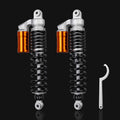 Pair of front air shock absorbers with orange reservoir and black coil springs
