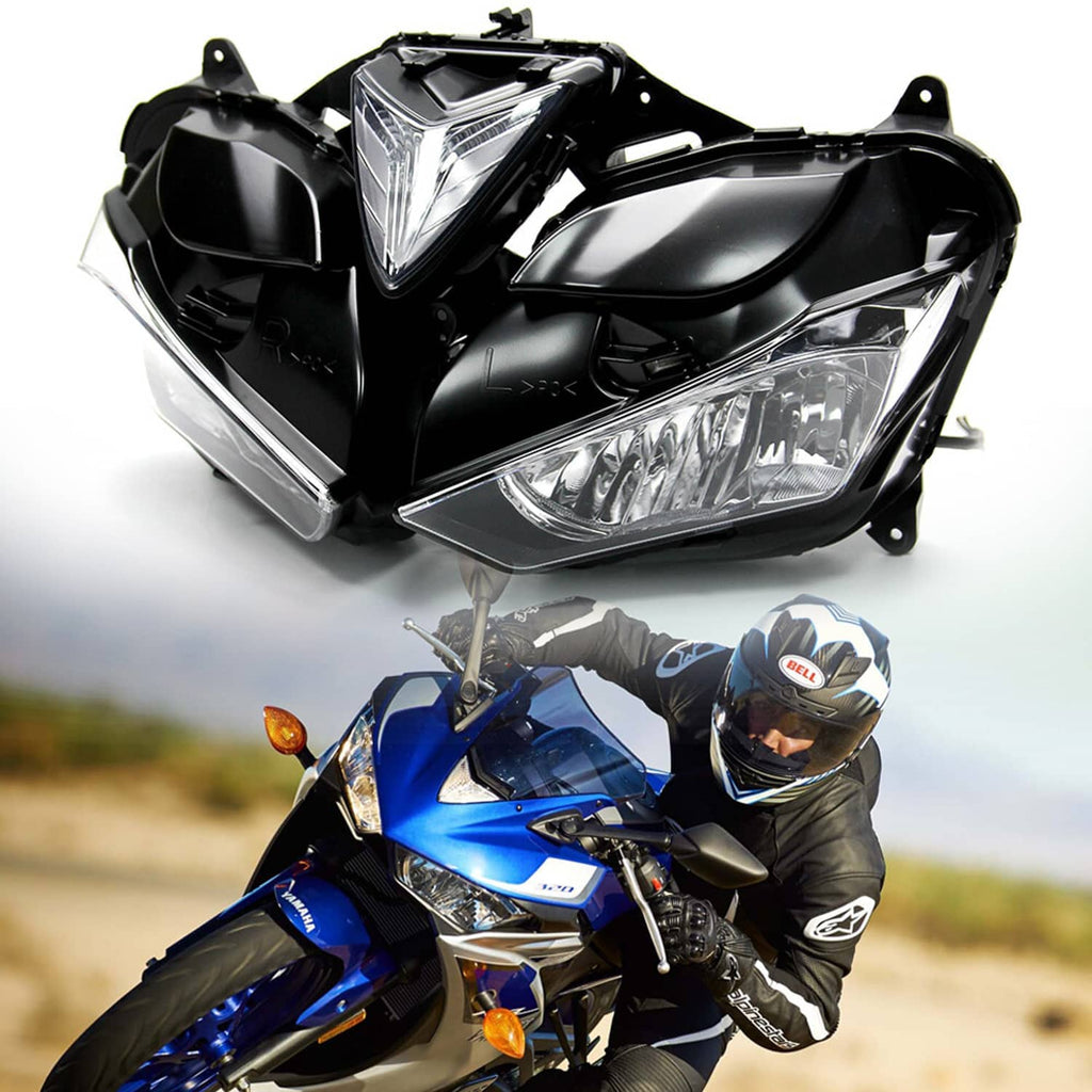 Black motorcycle headlight assembly with clear high beam lens and side headlamp housings