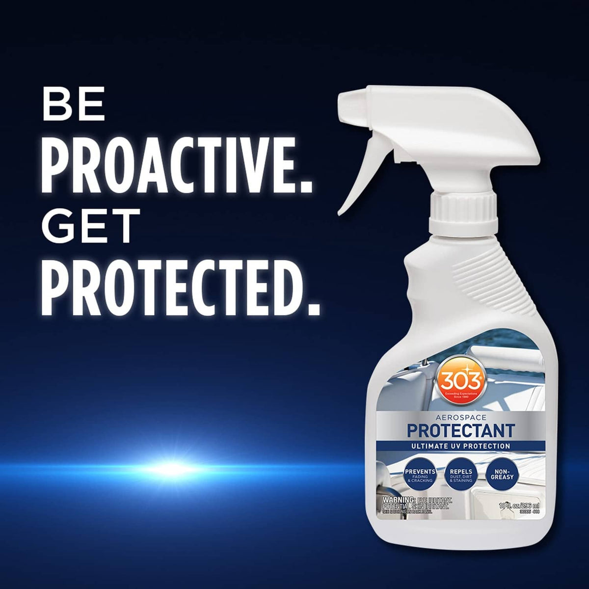 Aerospace protectant spray bottle with white trigger, upright on blue backdrop