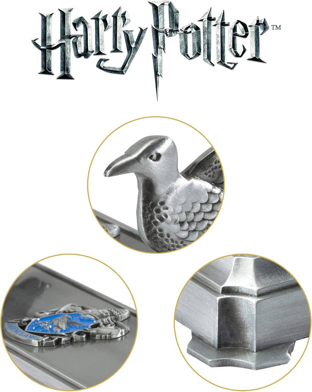 Silver wand stand close-up showing raven figure and blue inlay details