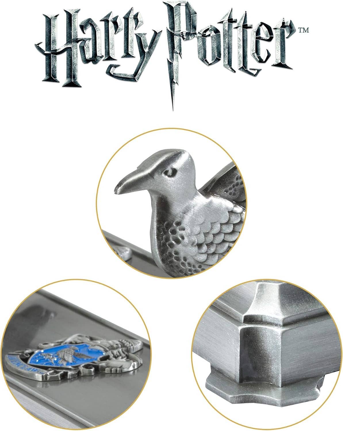 Silver wand stand close-up showing raven figure and blue inlay details