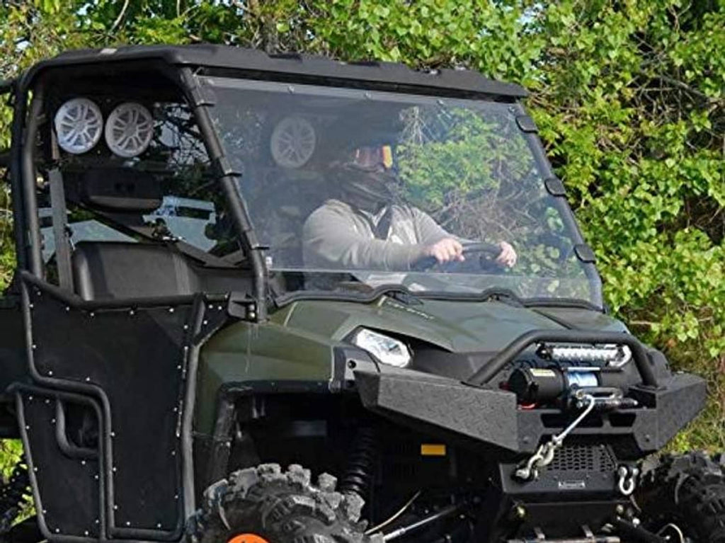 Clear full windshield for UTV with black frame, front bracing, and side panel