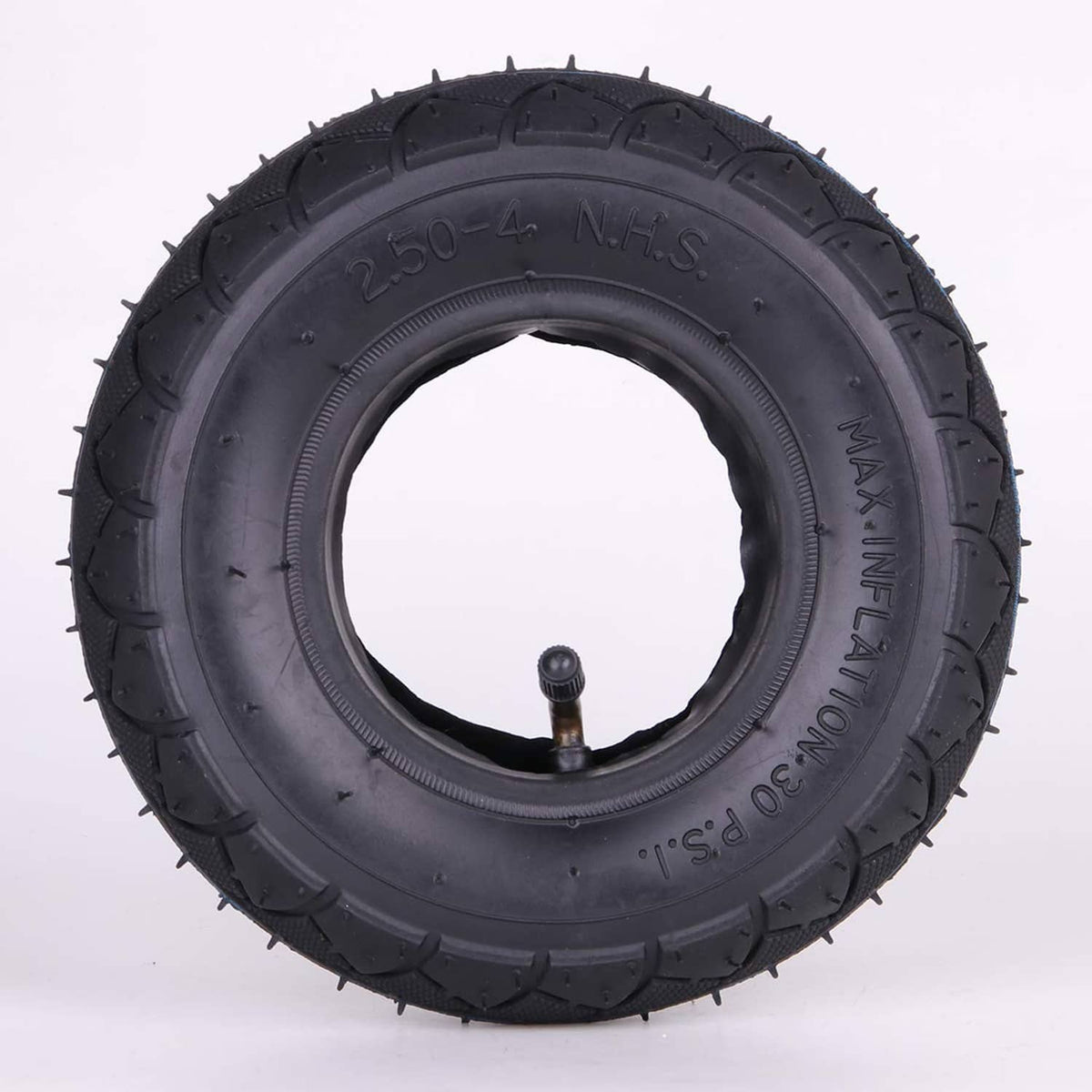 Black tire and inner tube with valve, 2.50-4 N.H.S size marking