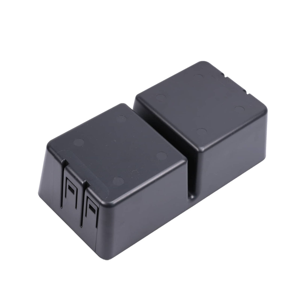 Two black cup holder bezel blocks with molded markings and side slots