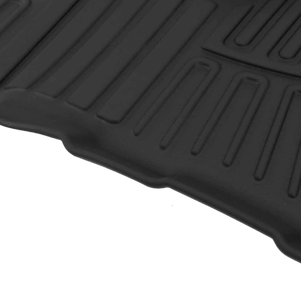 Black TPE floor mat with raised anti-slip ridges and molded grip channels