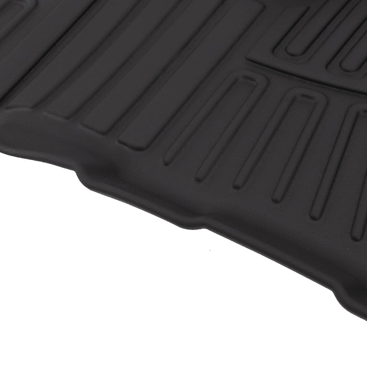 Black TPE floor mat with raised anti-slip ridges and molded grip channels