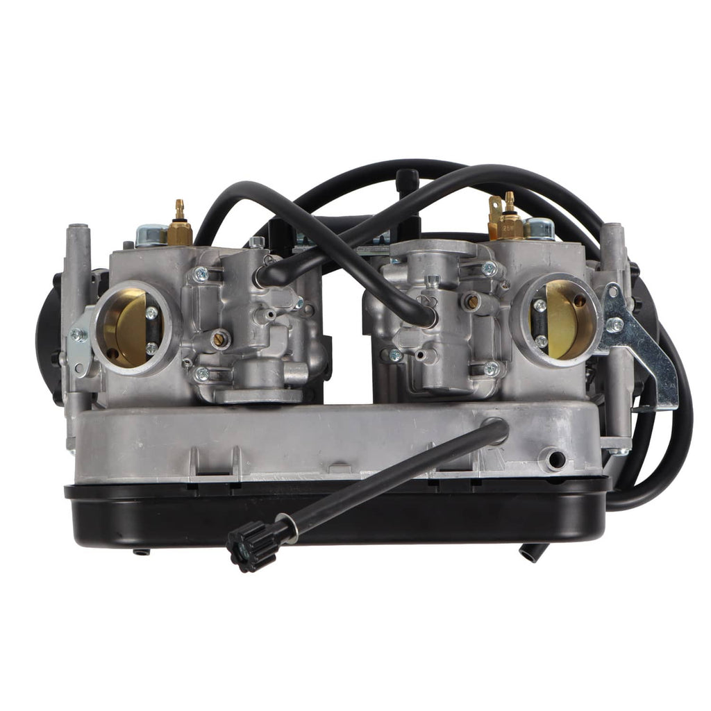 Dual carburetor assembly with two brass inlet ports and black hose routing