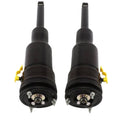Pair of black rear air suspension strut assemblies with yellow clips and metal mounting hardware