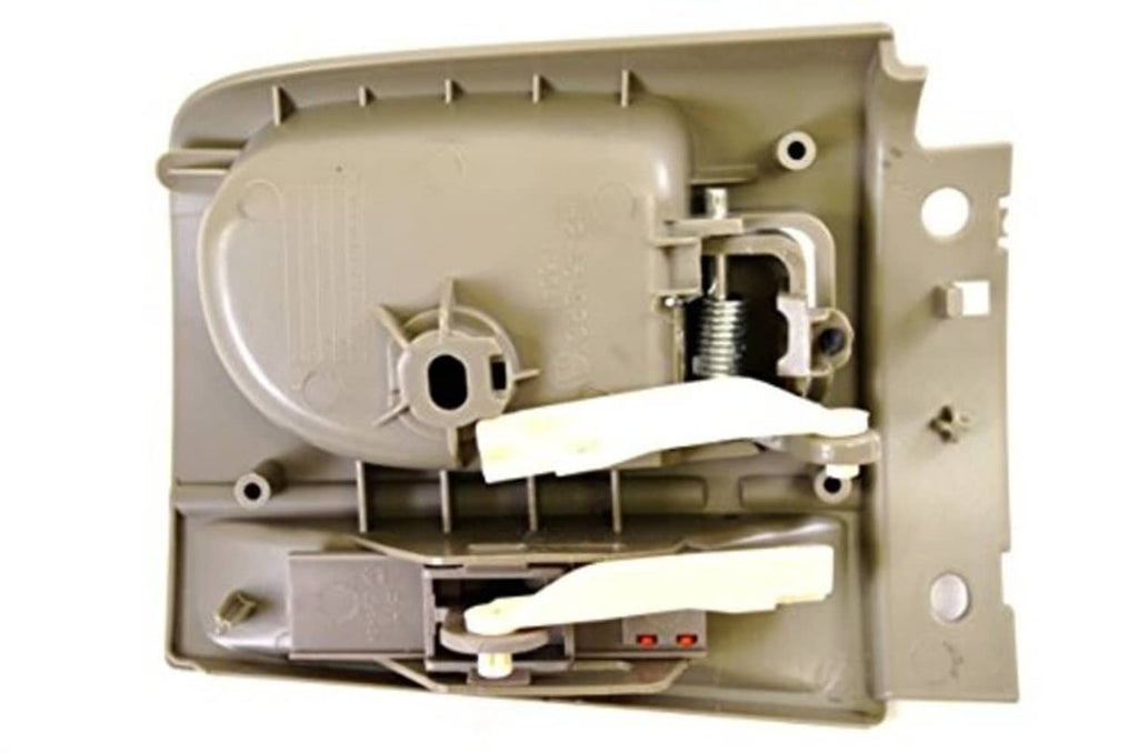 Gray interior door handle interior mechanism view with spring and mounting pins