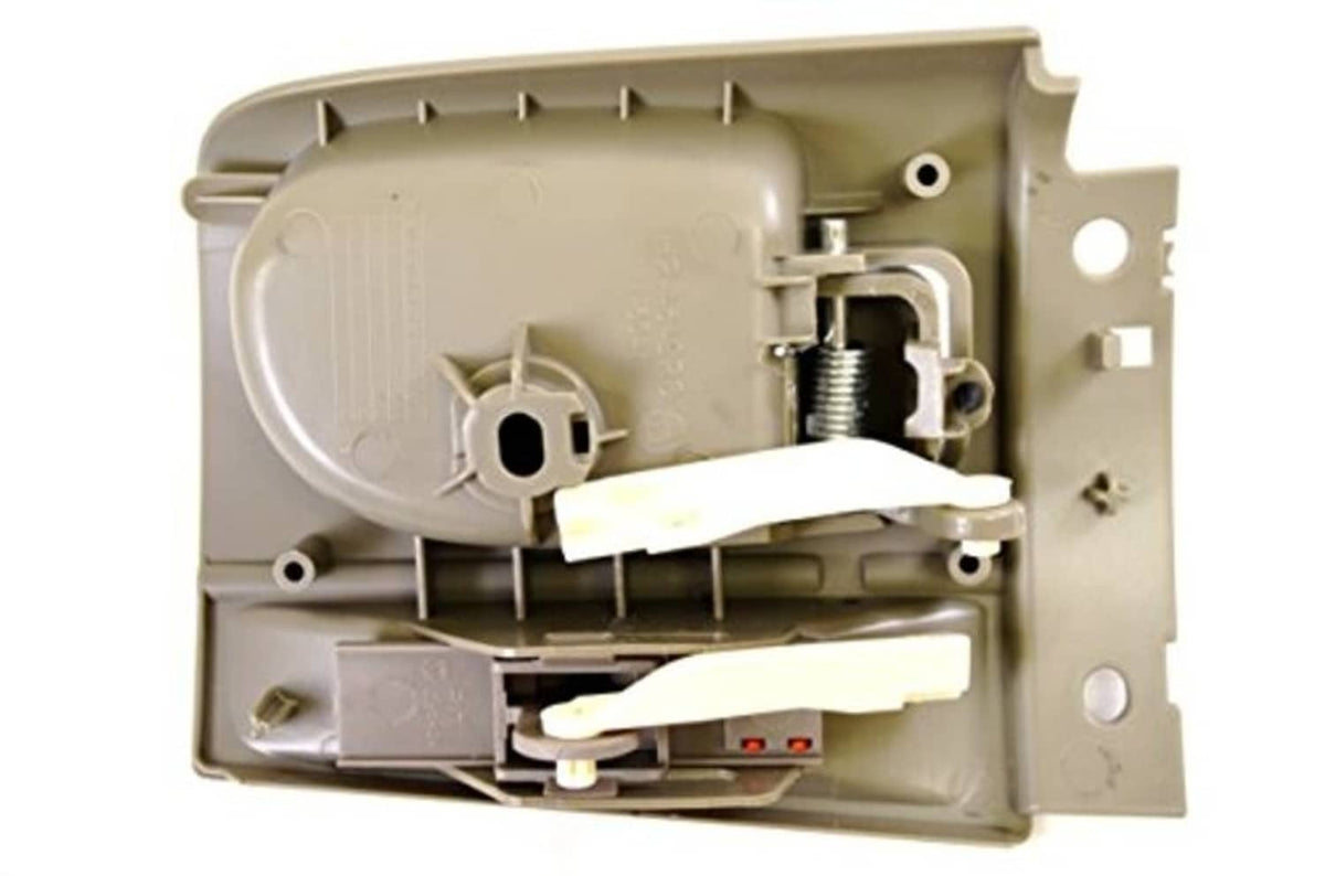 Gray interior door handle interior mechanism view with spring and mounting pins