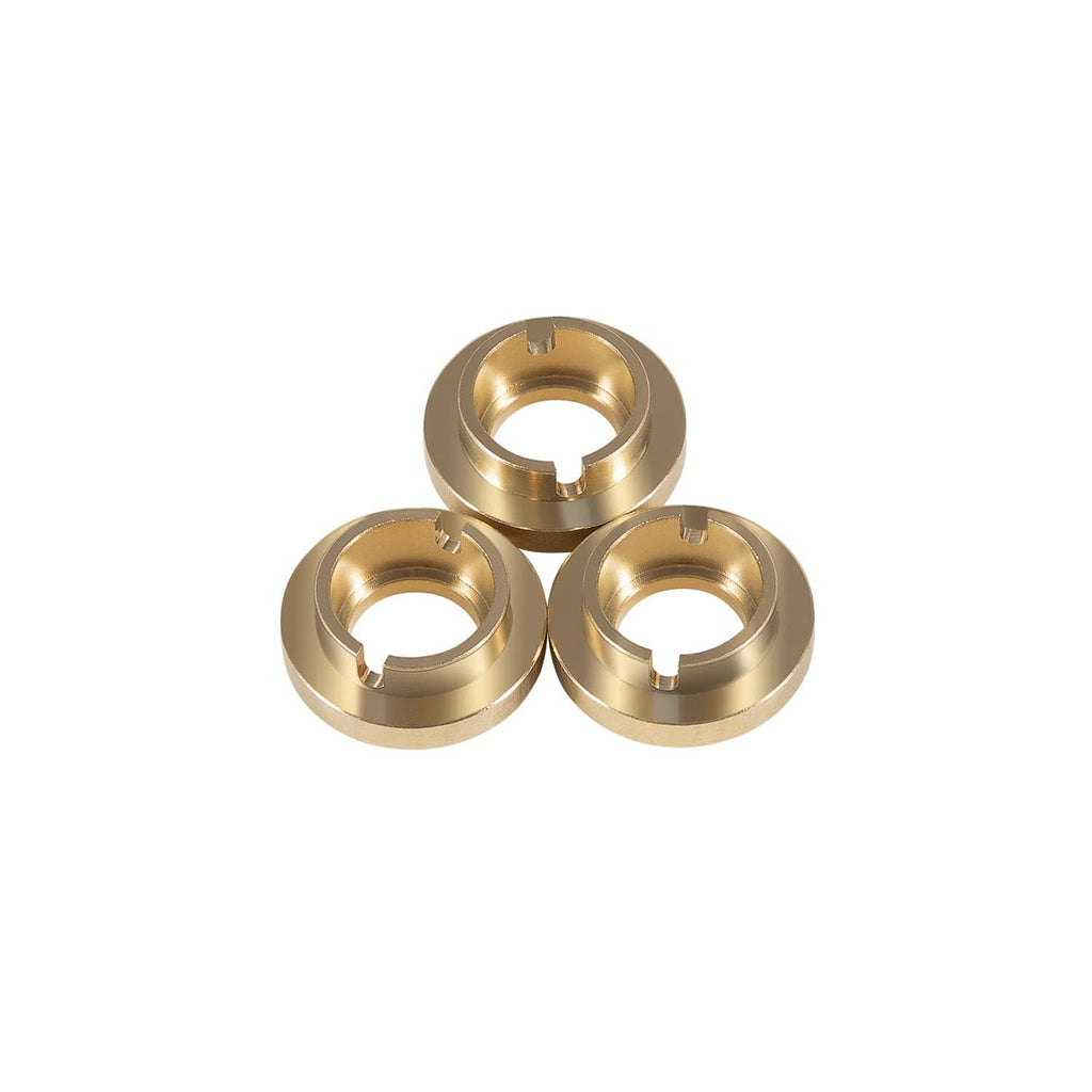 Three brass sealing rings with center holes