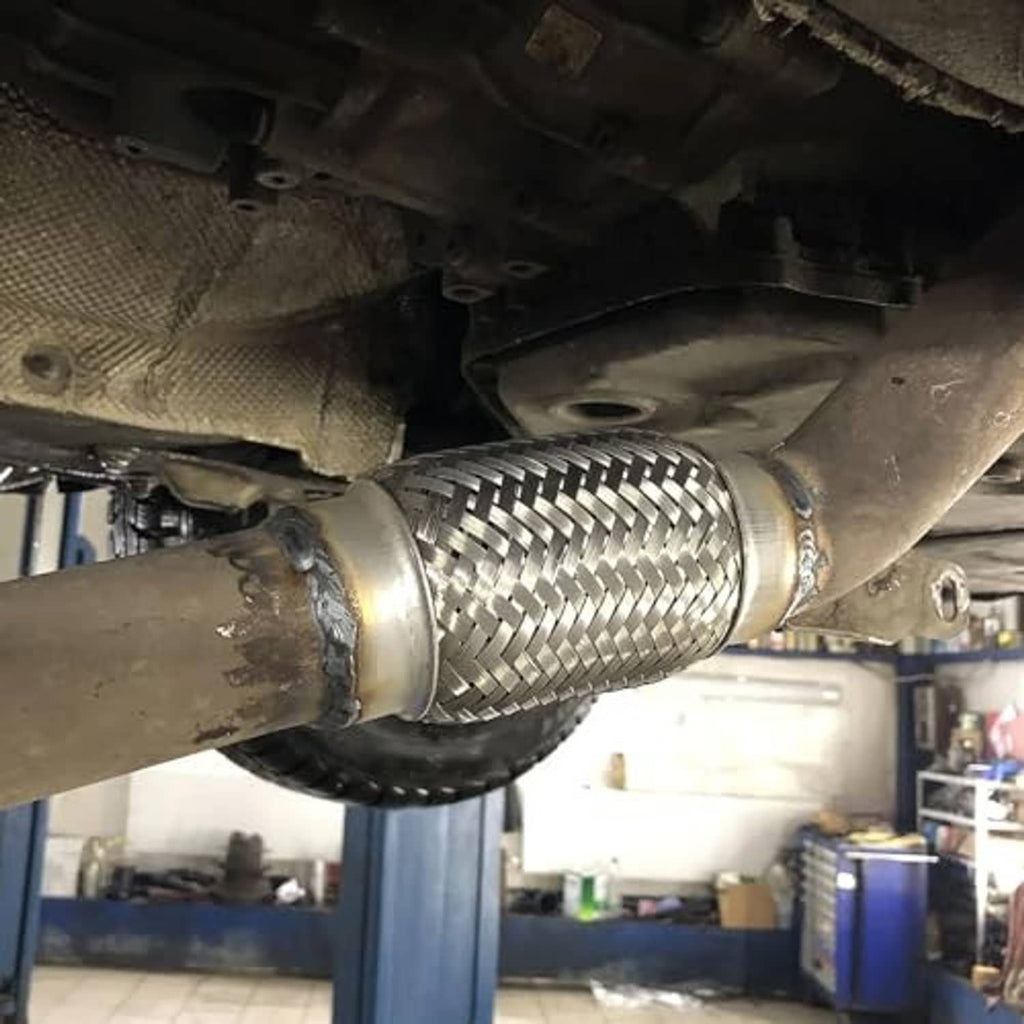 Stainless steel double-braided exhaust flex pipe installed on an undercarriage