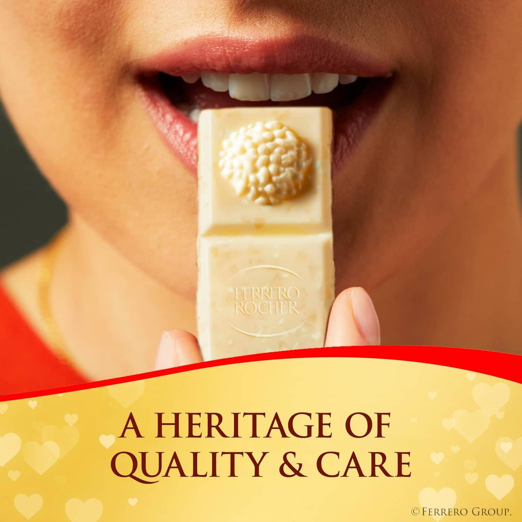 Ferrero Rocher white hazelnut chocolate bar, held between fingers