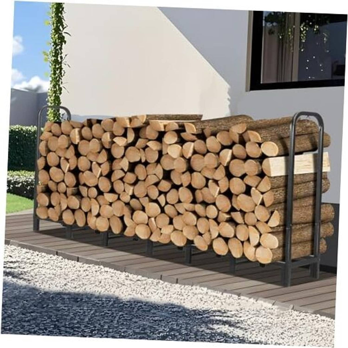 Outdoor firewood rack holding stacked logs with black steel side rails and curved handles