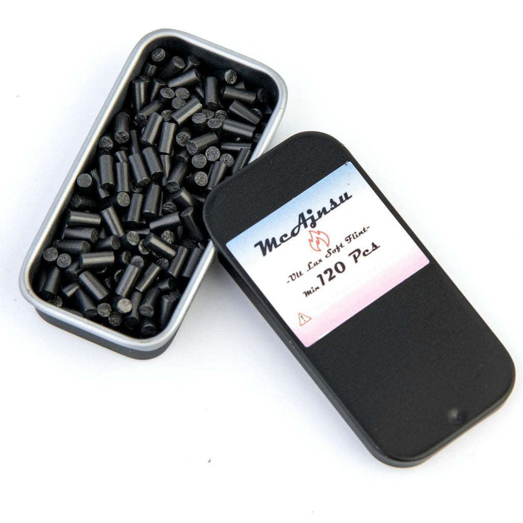 Universal lighter flint refill set in metal tray with assorted black flint pieces