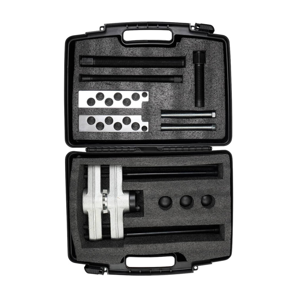 Kingpin press removal tool kit in open black case with steel plates and rods