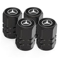 Set of 4 black metal tire valve stem caps with Mercedes-style emblem, knurled tops