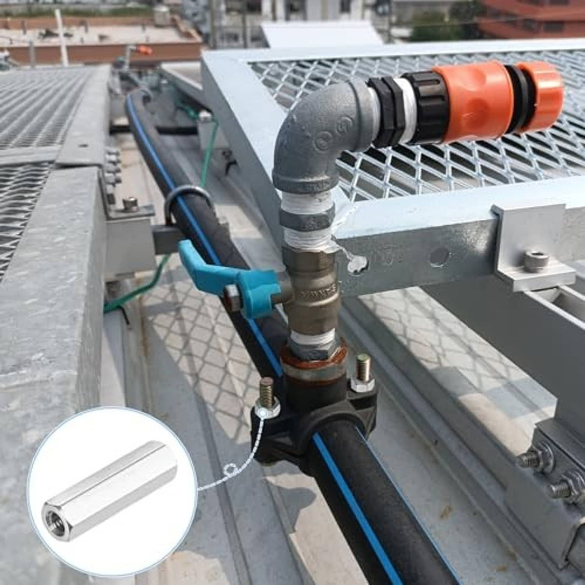Stainless steel threaded coupling nut on metal beam assembly outdoors