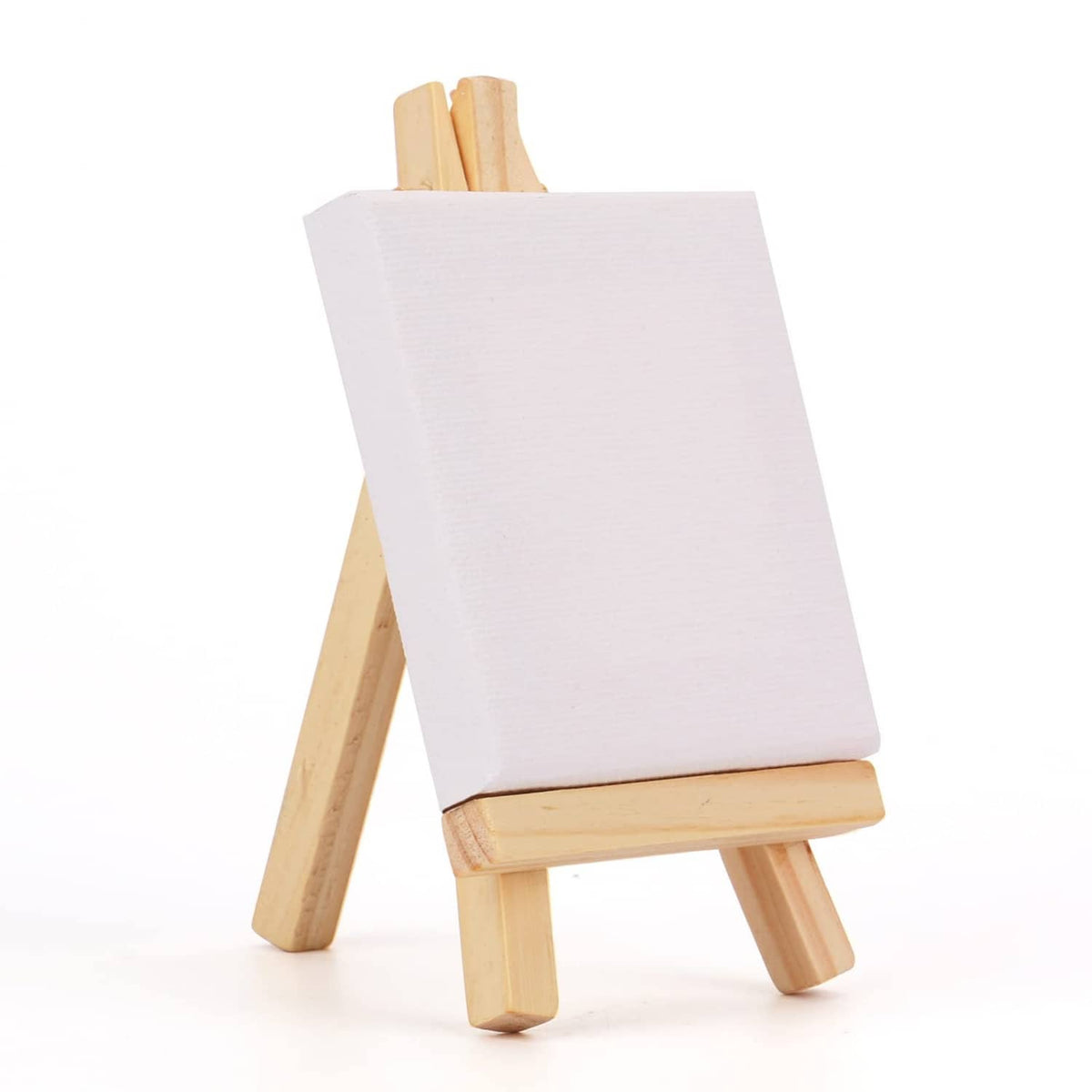 Single mini canvas on a wooden tabletop easel with blank white canvas