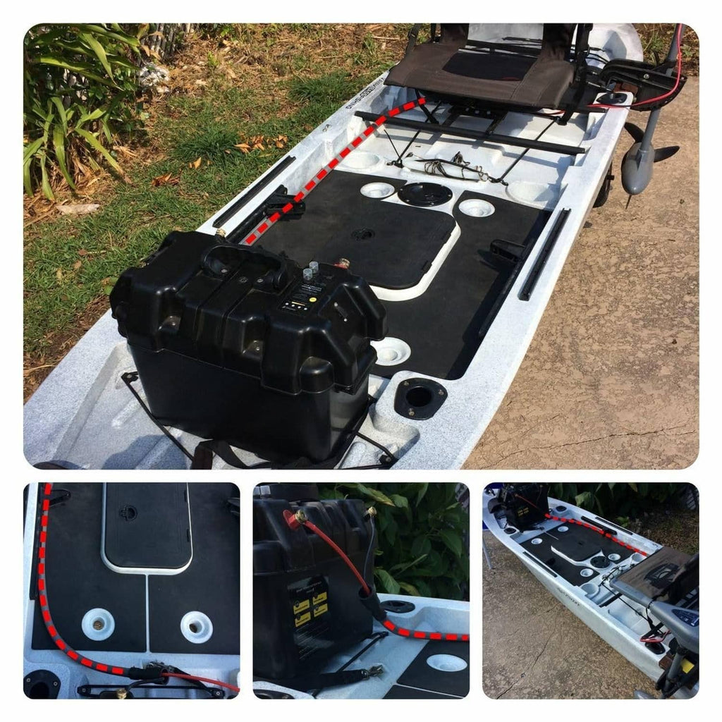 Battery extension cable connected on boat deck with black battery box and red/black leads.