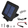 Black 6V solar panel charger with mounting hardware, screws, and DC power cable