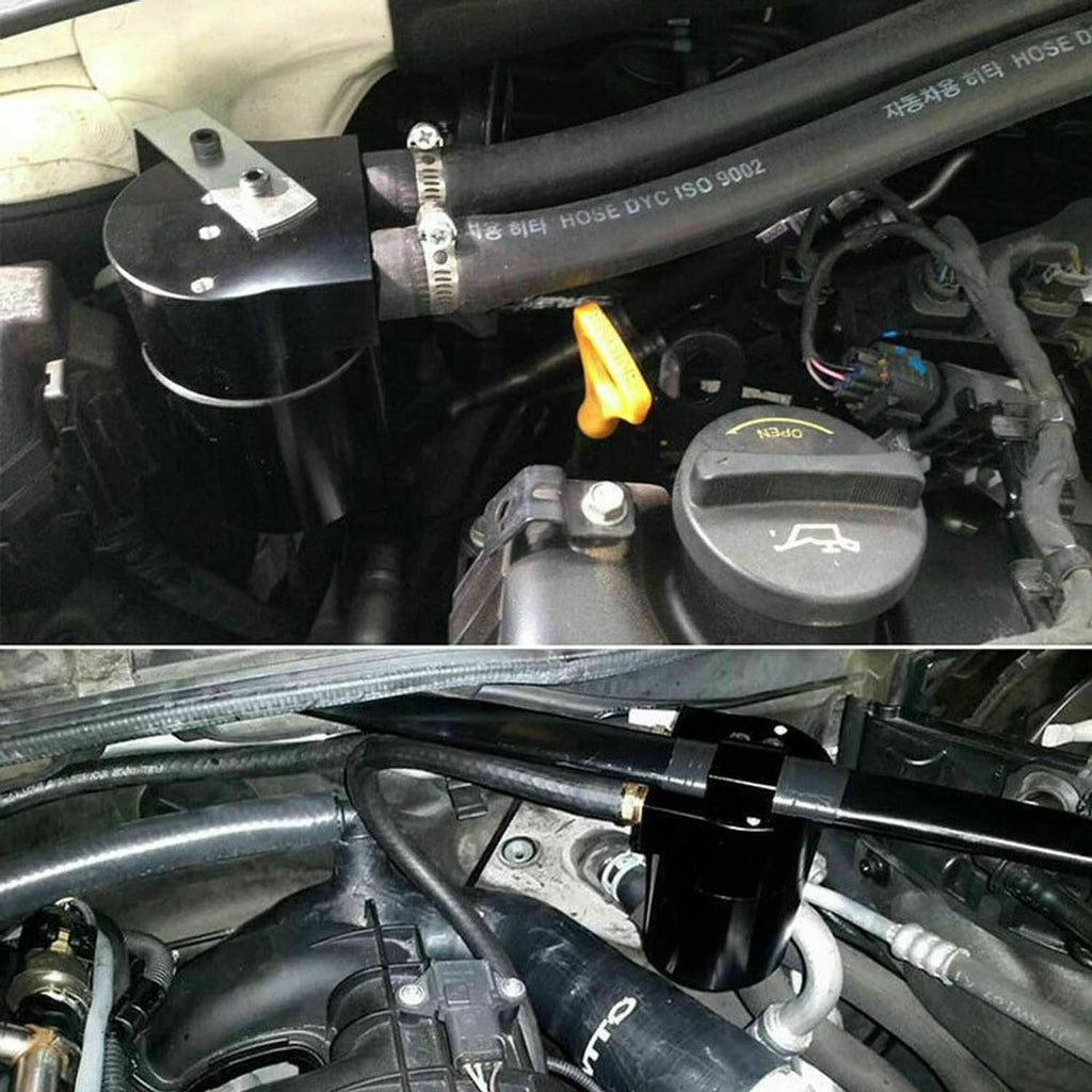 Black oil catch can mounted in engine bay with hoses and bracket