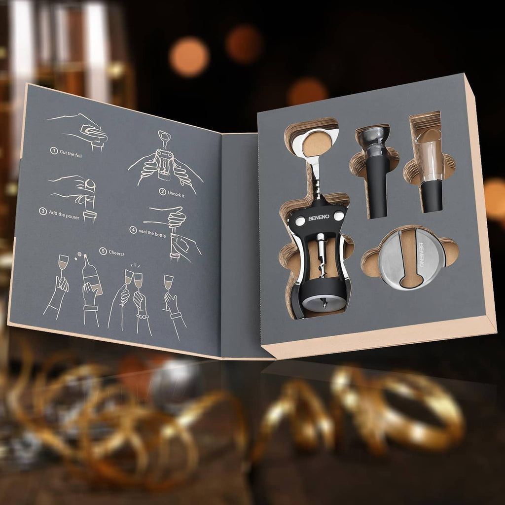 Opened wine accessory gift box showing black cork tools and stainless pourer pieces