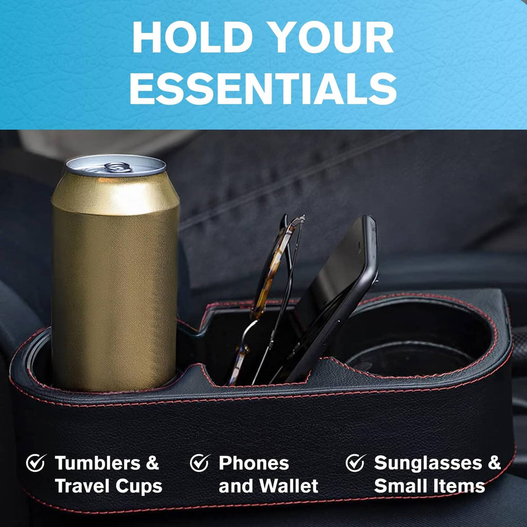 Black car console organizer with cup holder and slots holding a tumbler, phone, and sunglasses