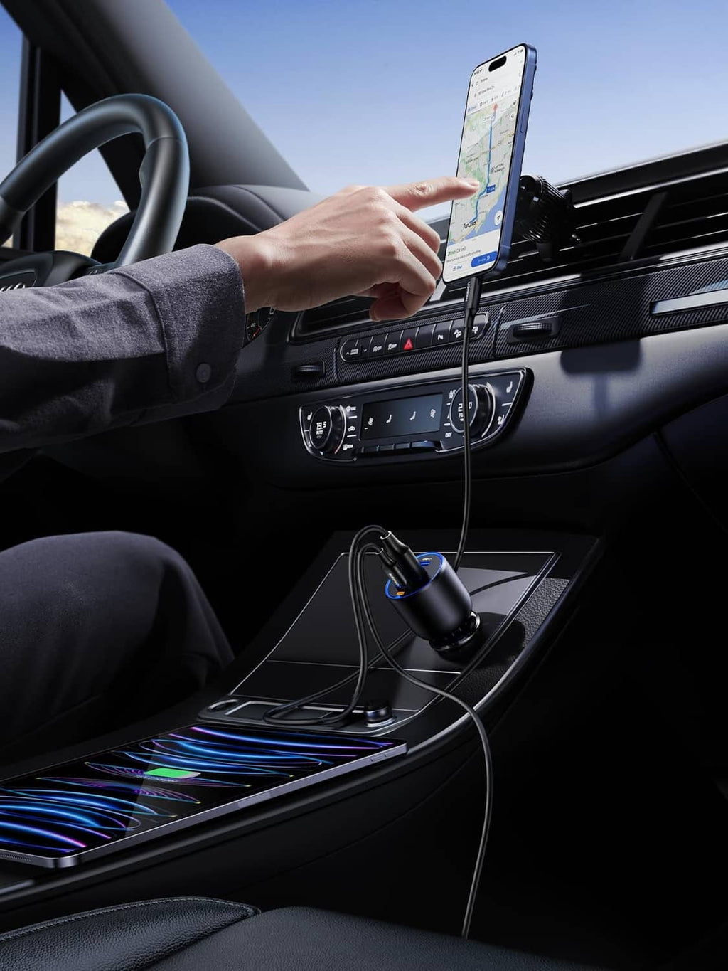 Car USB-C charger plugged into the dashboard power port with connected cable