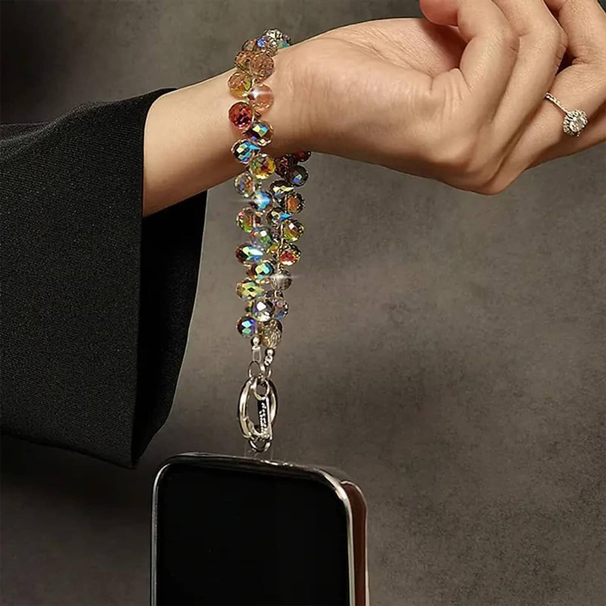 Crystal beaded wrist strap with multicolor iridescent beads and silver-tone chain clasp