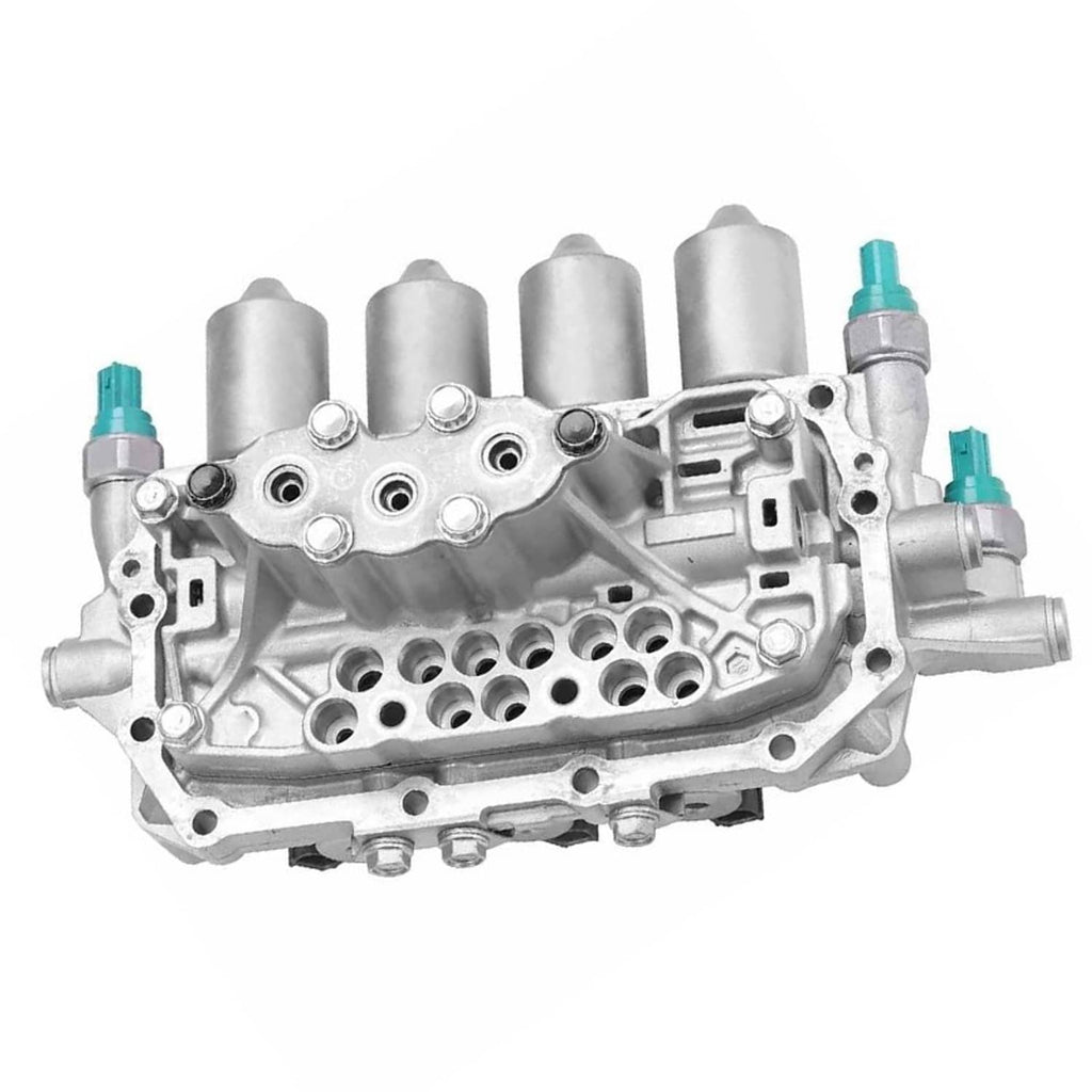 Valve body assembly, side view, silver housing with teal connectors and internal passage openings