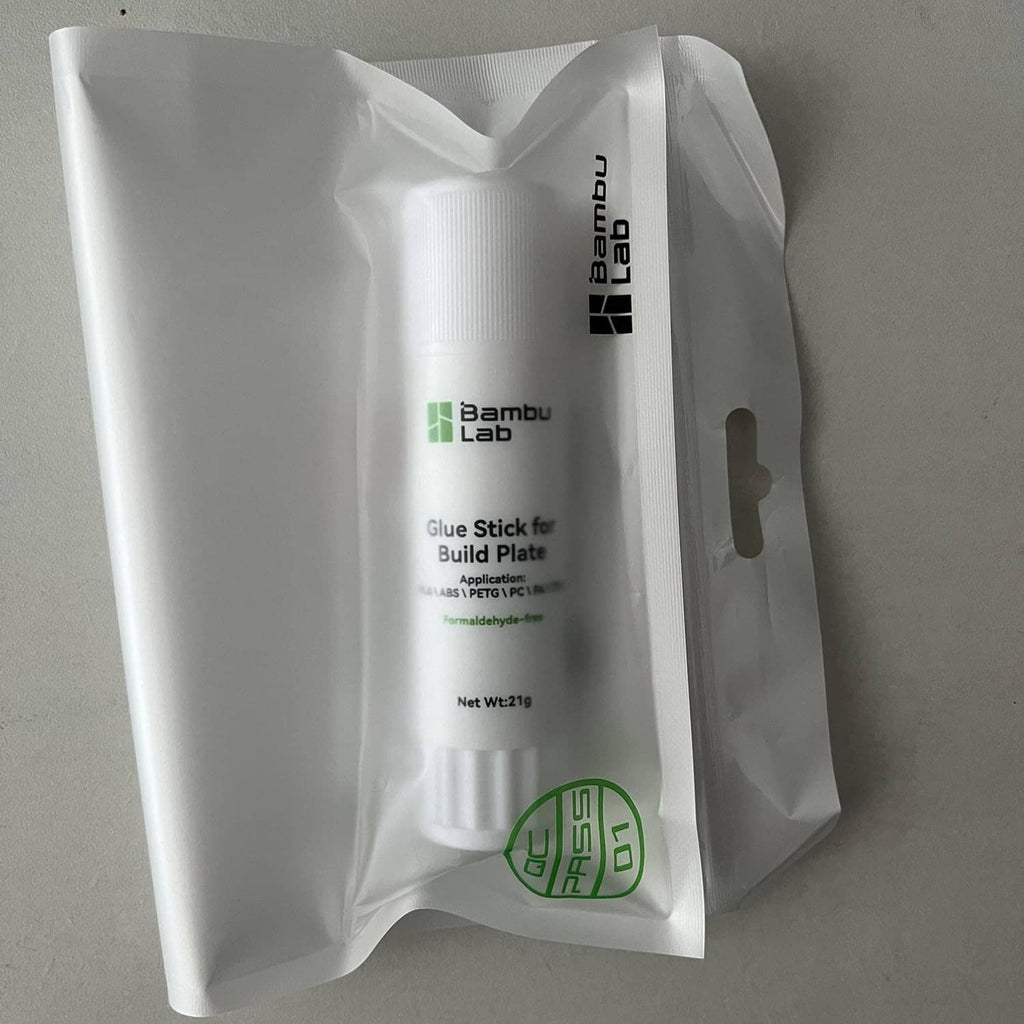 Bambu Lab glue stick for build plate, white bottle inside clear retail bag